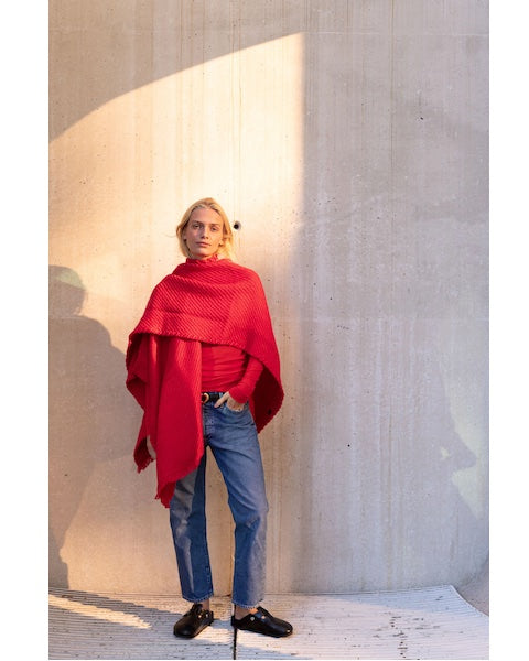 Front view of woman wearing Wehve Ava:AN in concrete setting