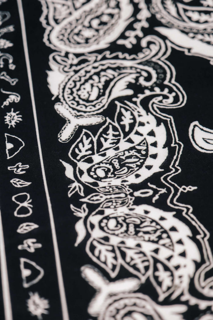 close up of Éclectique's Black Paisley Bandana