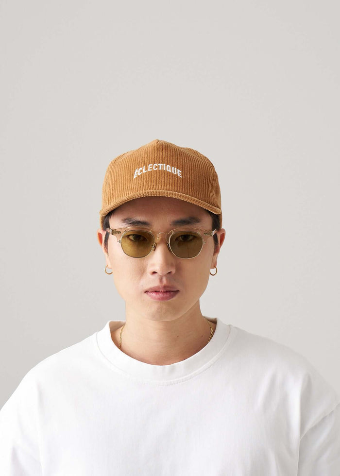 corduroy snapback hat in amber ash front view on model