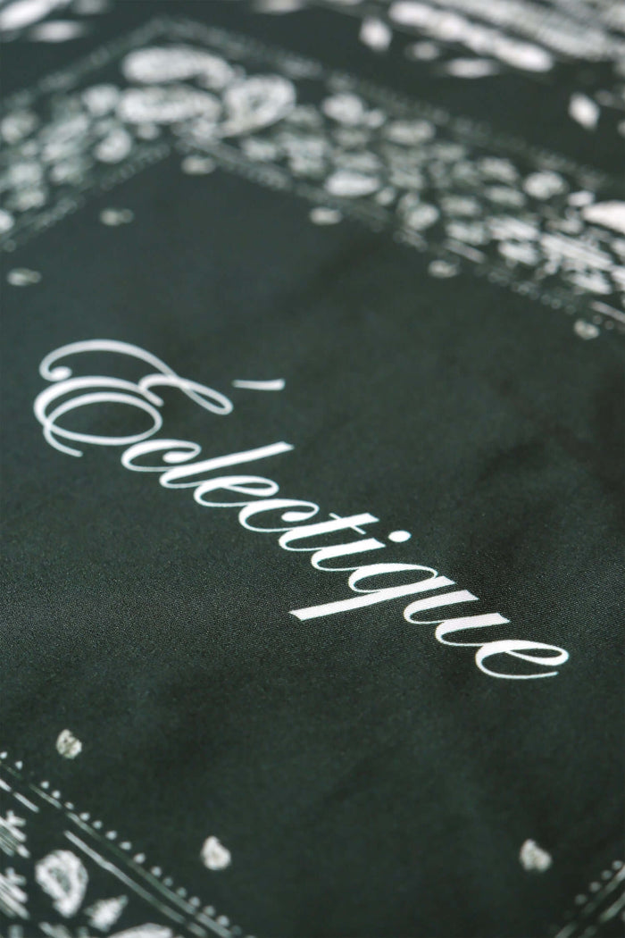 green silk scarf in Mountain View Green with Éclectique script logo