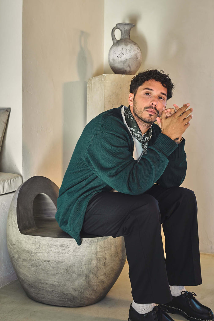 Green v neck cardigan in Scarab green styled on male model