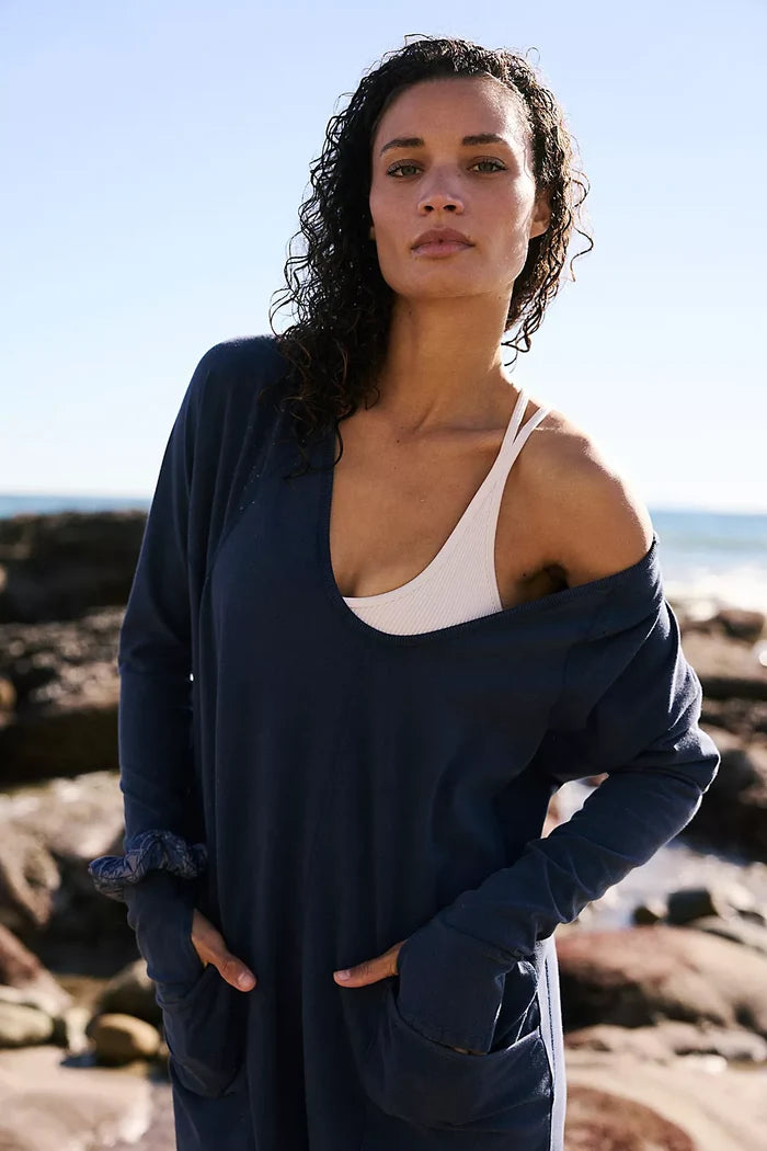 Woman wearing Free People Hot Shot Long Sleeve One Midnight Navy on rocky beach