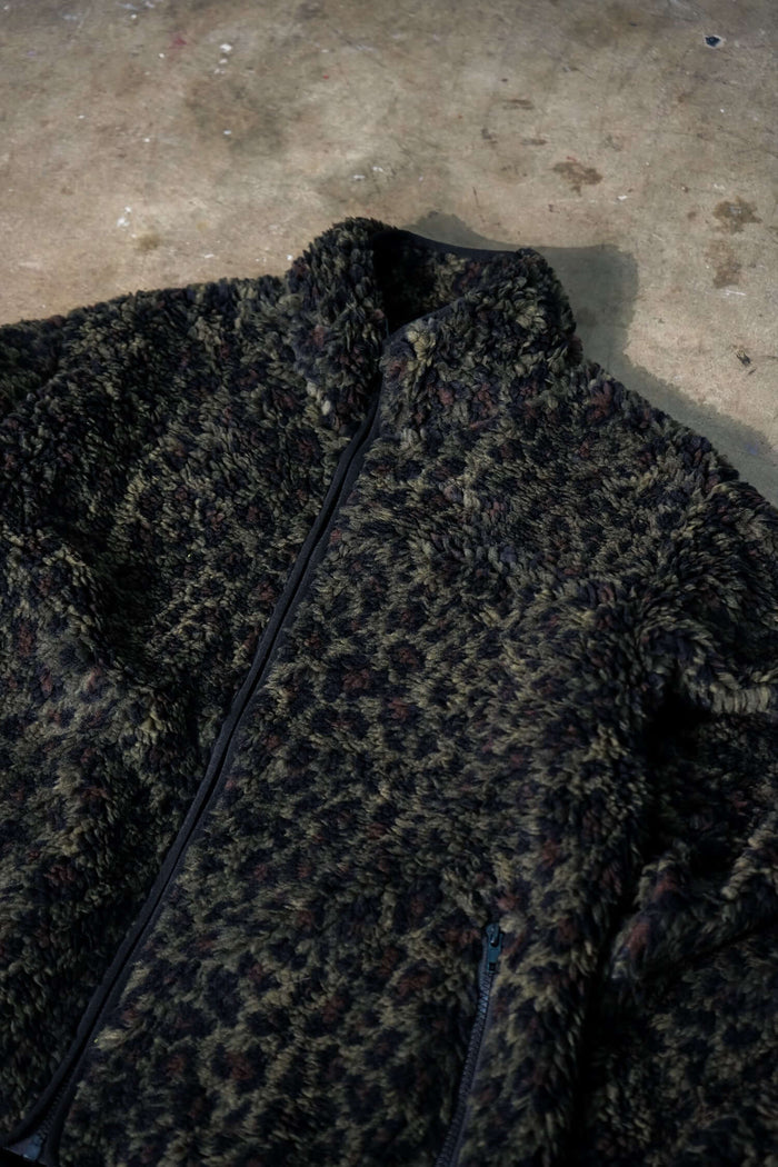 Leopard fleece jacket texture close-up by Éclectique