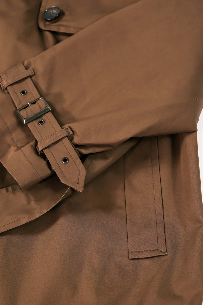 Men’s Camel Trench Coat detailing with buckle and cuff strap.