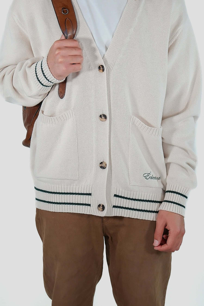 White v neck cardigan in Vanilla Ice worn with brown pants